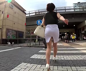 Japanese MILF in white skirt